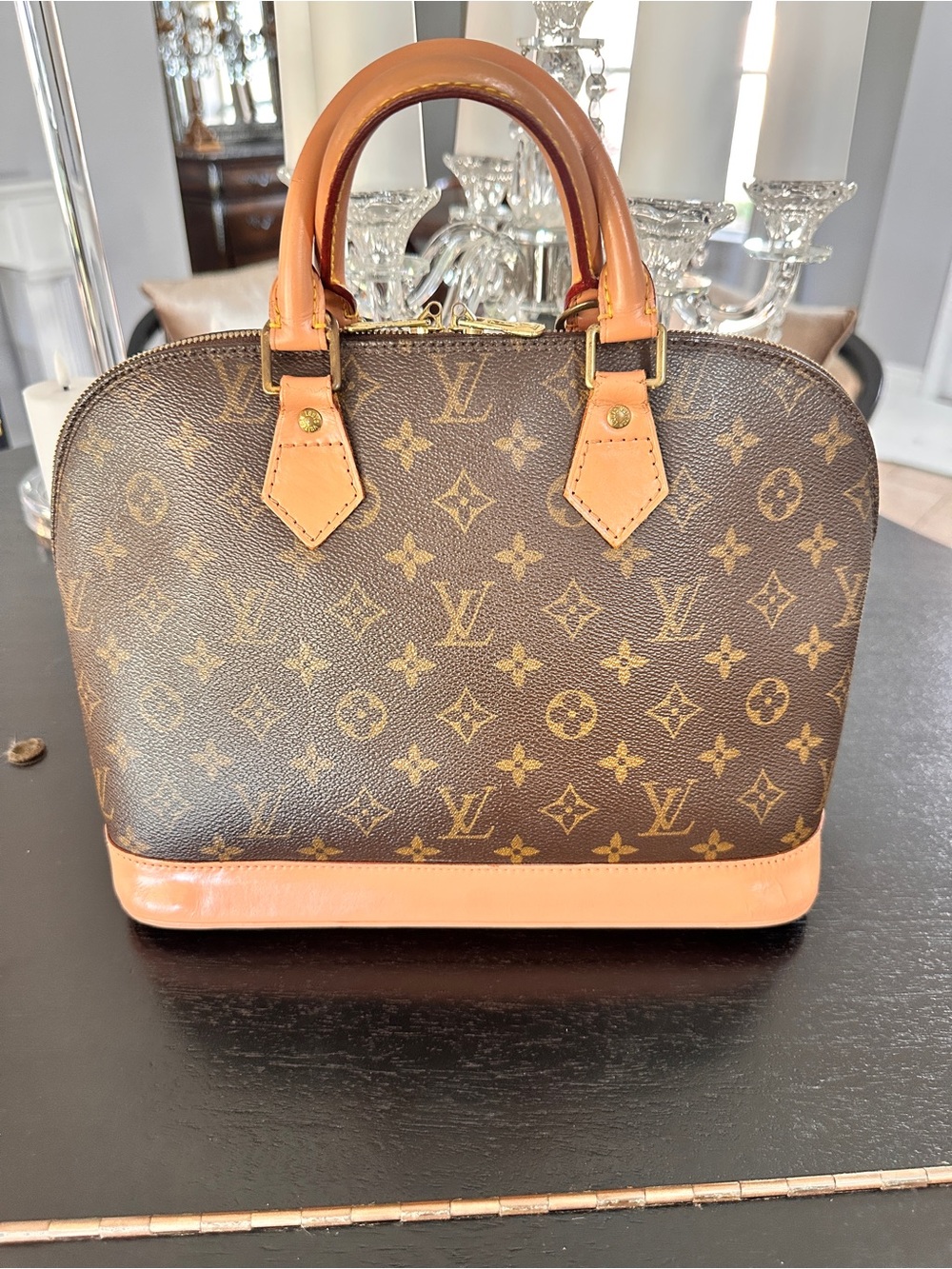 Louis Vuitton Alma PM -  This beautiful satchel levels up any wardrobe!